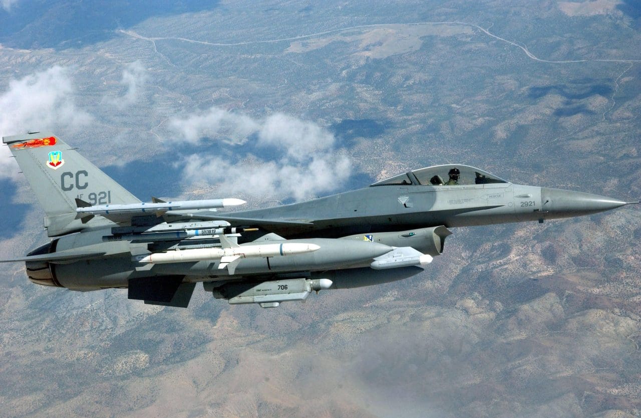 OVER NEVADA -- An F-16C Fighting Falcon, assigned to the 27th Fighter Wing, Cannon Air Force Base, N.M., heads out for a mission over the Nevada Test and Training Ranges during Red Flag 04-3 here Aug 20. More than 100 aircraft and 2,500 participants are involved in this exercise. Red Flag is a realistic combat training exercise involving the U.S. Air Force and its allies. (U.S. Air Force photo by Tech. Sgt. Kevin Gruenwald)