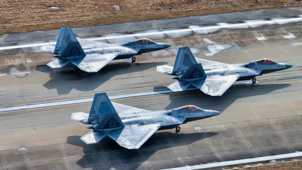 LANGLEY AIR FORCE BASE, Va. – F-22 Raptors from the 1st Fighter Wing sit in position on the runway fduring the Elephant Walk at Langley Air Force Base, Virginia, Jan. 31, 2025. The surge was designed to showcase the wing’s operational readiness and its ability to rapidly mobilize airpower. The 1st FW operates F-22 Raptors and T-38 Talons, maintaining combat capabilities that enable the U.S. Air Force to execute missions across the globe. With a focus on air superiority, the 1st FW plays a critical role in defending the nation’s interests. (U.S. Air Force photo by Tech Sgt. Matthew Coleman-Foster)