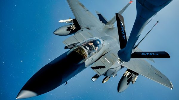 A U.S. Air Force KC-135 Stratotanker offloads fuel to U.S. Air Force F-15 Strike Eagles over the U.S. Central Command area of responsibility, April 11, 2025. The F-15E is deployed to the CENTCOM AOR to reinforce regional stability and deter aggression from violent extremist organizations.. (U.S. Air Force photo by Senior Airman Keegan Putman)