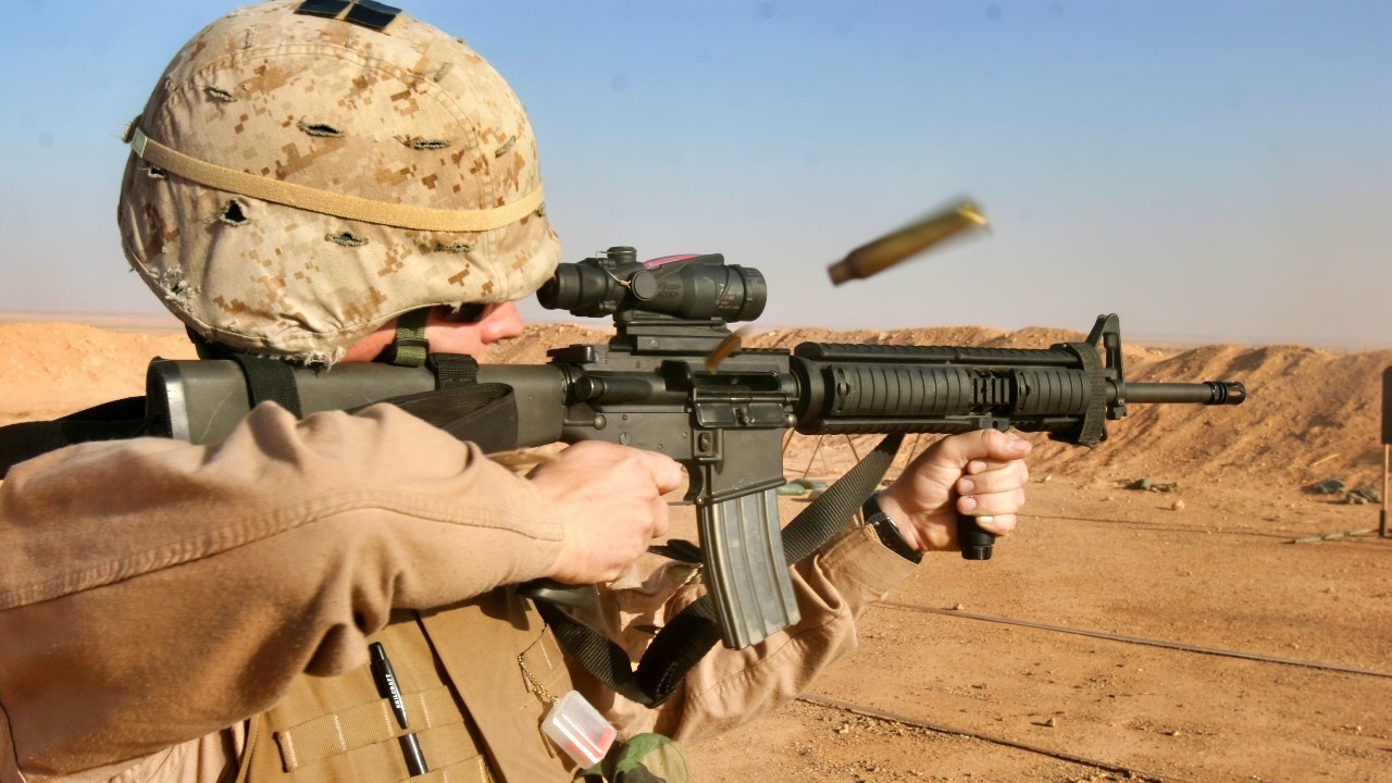 CAMP KOREAN VILLAGE, Iraq (May 15, 2007) – Sergeant Christopher L. McCabe fires his rifle during monthly range training here May 15. The Marines and sailors of Detachment 1, Combat Logistics Battalion 2, 2nd Marine Logistics Group (Forward), provide necessities and services to coalition forces throughout the area of operations. McCabe, a Bellaire, Ohio, native, is the staff noncommissioned officer-in-charge of the maintenance section, Det 1, CLB-2, 2nd MLG
