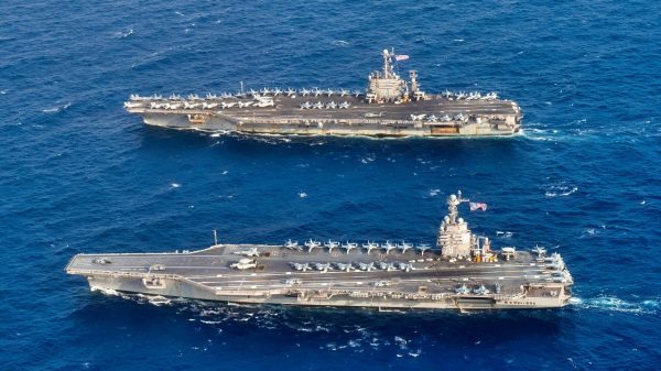 The U.S. Navy Gerald R. Ford–class aircraft carrier USS Gerald R. Ford (CVN-78) and the Nimitz-class aircraft carrier USS Harry S. Truman (CVN-75) underway in the Atlantic Ocean on 4 June 2020, marking the first time a Gerald R. Ford–class and a Nimitz-class aircraft carrier operated together underway.