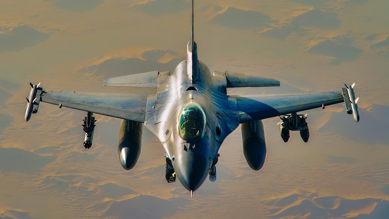 A U.S. Air Force F-16 Fighting Falcon based in the Central Command area of operations conducts armed aerial patrols in Somalia in support of Operation Octave Quartz, Jan. 9, 2020. The F-16s support to OOQ demonstrates the U.S. military’s reach and power projection across vast distances to hold adversaries such as al-Shabaab at risk with flexible, precise and lethal force that is capable of rapidly responding anywhere on the globe. The mission of OOQ is to reposition U.S. Department of Defense personnel from Somalia to other locations in East Africa. (U.S. Air Force photo by Staff Sgt. Taylor Harrison)