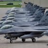 F-16 Fighting Falcons assigned to the 114th Fighter Wing sit ready on the ramp while conducting an elephant walk at Joe Foss Field, South Dakota, July 2, 2025. The 114th Fighter Wing conducted an elephant walk to demonstrate its ability to project fighter airpower. (U.S. Air National Guard photo by Master Sgt. Luke Olson)