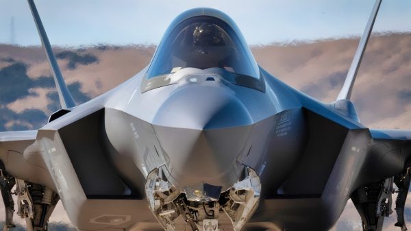 A pilot from the 34th Fighter Squadron conducts pre-flight preparations in the cockpit of an F-35A Lighting II on the tarmac at Santa Maria Airport, Calif., during Bamboo Eagle 24-3. During Bamboo Eagle, the 388th Fighter Wing is functioning as a force element at a “spoke location,” providing fifth-generation airpower to a larger force operating in the eastern Pacific region. The spoke locations are smaller than an airbase, a cluster of tents, a small footprint of equipment and personnel. (U.S. Air Force photo by Micah Garbarino)