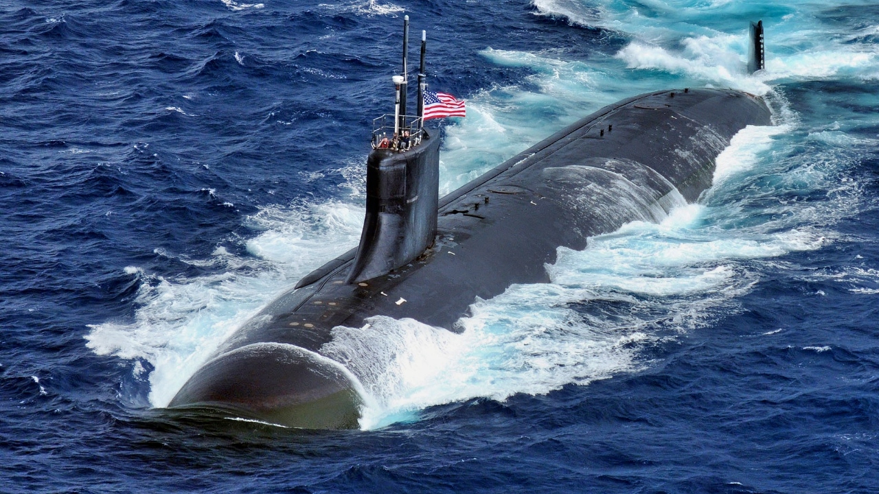(Nov. 17, 2009) USS Connecticut (SSN 22) steams through the Pacific Ocean after participating in a 26 ship formation photo exercise. George Washington, the Navyís only permanently forward-deployed aircraft carrier participated in a photo exercise which was the culmination of ANNUALEX 21G, the largest annual bilateral exercise with the U.S. Navy and the Japan Maritime Self Defense Force. (U.S. Navy photo by Mass Communication Specialist Adam K. Thomas/RELEASED)