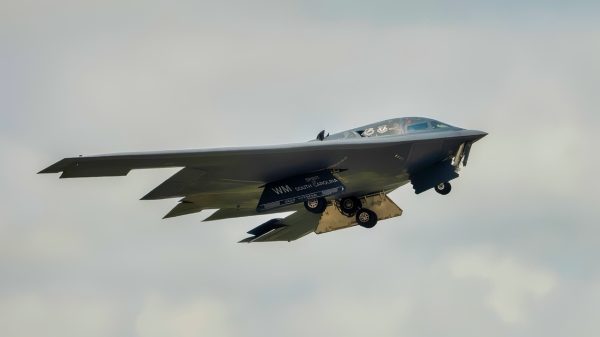 A B-2 Spirit stealth bomber assigned to Whiteman Air Force Base takes off from Oscoda, Michigan, Aug. 5, 2025. Maintainers and pilots conducted a flight crew changeover during Exercise Northern Strike, a National Guard Bureau sponsored training event designed to build readiness with joint and partner forces in all domains of warfare. (U.S. Air National Guard photo by Staff Sgt. Whitney Erhart)