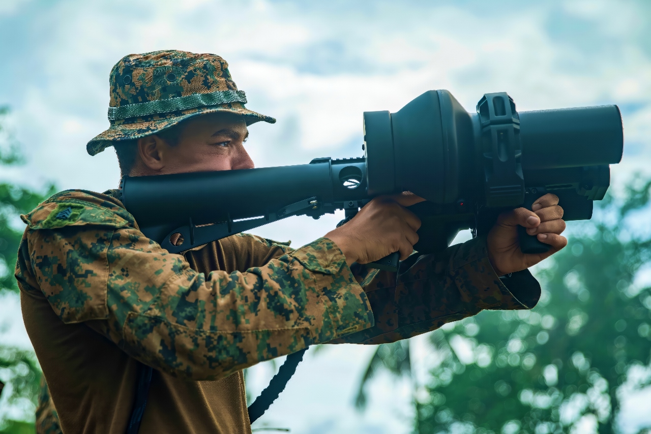 U.S. Marine Corps Sgt. Colin Clark, a mortarman assigned to Bravo Company, Battalion Landing Team 1/5, 15th Marine Expeditionary Unit, and a native of Texas, engages a target with a NightFighter S counter-unmanned aerial vehicle system during a demonstration for Philippine Marines assigned to Intelligence Company, 3rd Marine Brigade, as part of exercise KAMANDAG 8 at Tarumpitao Point, Palawan Province, Philippines, Oct. 17, 2024. KAMANDAG is an annual Philippine Marine Corps and U.S. Marine Corps-led exercise aimed at enhancing the Armed Forces of the Philippines’ defense and humanitarian capabilities by providing valuable training in combined operations with foreign militaries in the advancement of a Free and Open Indo-Pacific. This year marks the eighth iteration of this exercise and includes participants from the French Armed Forces, Royal Thai Marine Corps, and Indonesian Marine Corps; including continued participation from the Australian Defense Force, British Armed Forces, Japan Ground Self-Defense Force, and Republic of Korea Marine Corps. (U.S. Marine Corps photo by Sgt. Amelia Kang)