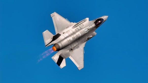 The F-22 Raptor performs a demonstration at the Mather Airshow in Sacramento, California, Sept. 23, 2018. The P-38 is a World War I-era fighter aircraft that was developed for the Army Air Corps. (U.S. Air Force photo by Senior Airman Lauren Parsons/Released)