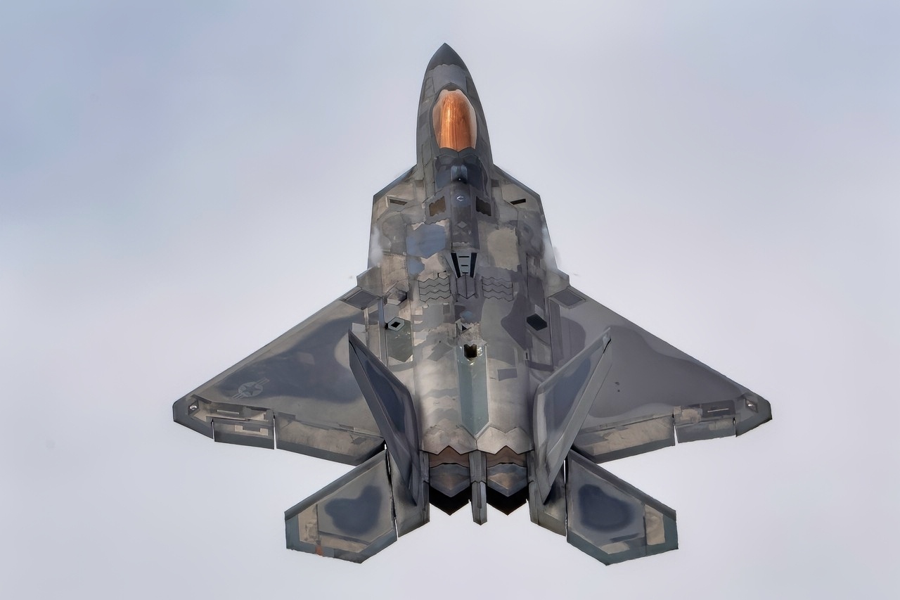 U.S. Air Force Maj. Josh Gunderson, F-22 Demo Team commander, performs the Raptor slide during the Geneseo Airshow July 10, 2021, Geneseo, N.Y. During the maneuver the aircraft actually slides down and backwards under control before Gunderson adjusts the aircrafts position and powers out of the maneuver. (U.S. Air Force photo by Staff Sgt. Don Hudson)