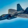 A U.S. Air Force KC-135 Stratotanker with the 434th Air Refueling Wing, Indiana, which had an aircrew with the 63rd Air Refueling Squadron, Florida, refuels a F-22 Raptor with the 325th Fighter Wing, Florida on February 23, 2021. The Stratotanker was on loan to MacDill Air Force Base. (U.S. Air Force photo by Senior Airman Tiffany A. Emery)