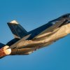 U.S. Air Force Major Kristin "BEO" Wolfe, F-35A Lightning ll Demonstration Team pilot and commander, flies during sunset over Mathers Airport, Calif., Sept. 24th, 2021, at the California Capital Airshow. The team consists of approximately 15 total Airmen to include the pilot and commander, pilot safety officers, superintendent, team chief, maintenance Airmen, aircrew flight equipment specialists, and public affairs personnel. (U.S. Air Force photo by Staff Sgt. Thomas Barley)
