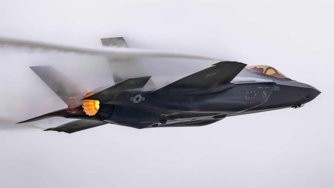 U.S. Air Force Maj. Kristin "BEO" Wolfe, F-35A Lightning II Demonstration Team pilot and commander, performs for F-135 engine maintainers assigned to the Oklahoma City Air Logistics Complex, at Tinker Air Force Base, Okla., May 25, 2021. The F-35A Demonstration Team put on the performance for the maintainers as a show of appreciation for keeping F-35s throughout the Department of Defense running and in the sky. (U.S. Air Force photo by Staff Sergeant Thomas Barley)