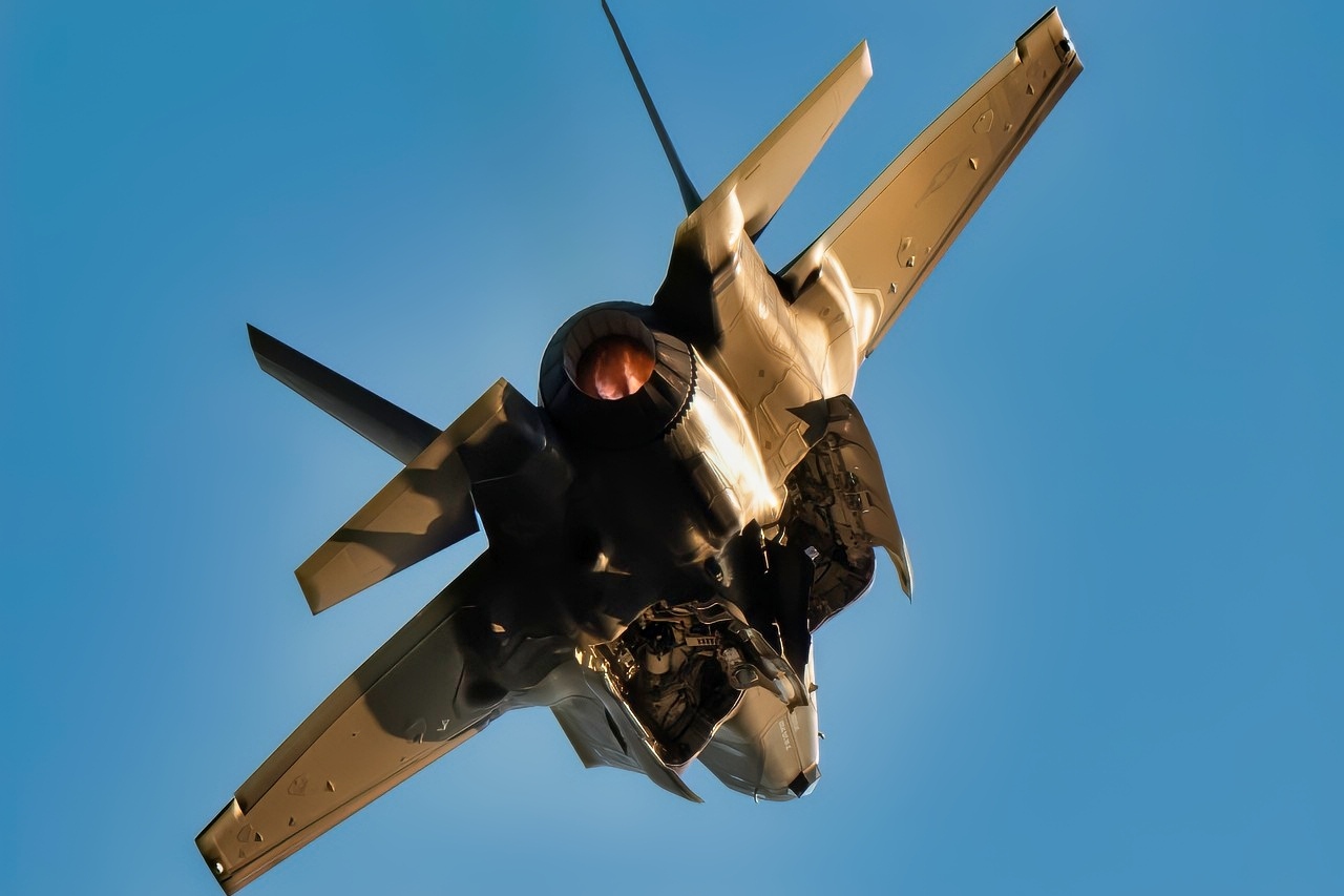 U.S. Air Force Major Kristin "BEO" Wolfe, F-35A Lightning ll Demonstration Team pilot and commander, flies during sunset over Mathers Airport, Calif., Sept. 24th, 2021, at the California Capital Airshow. The team consists of approximately 15 total Airmen to include the pilot and commander, pilot safety officers, superintendent, team chief, maintenance Airmen, aircrew flight equipment specialists, and public affairs personnel. (U.S. Air Force photo by Staff Sgt. Thomas Barley)