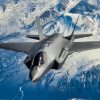 A new F-35A Lightning II fifth-generation fighter aircraft flies over the Alaska Canada Highway en route to its new home at the 354th Fighter Wing, Eielson Air Force Base, Alaska, April 21, 2020. The F-35 represents a new model of international cooperation, ensuring U.S. and Coalition partner security well into the 21st Century. (U.S. Air National Guard photo by Tech. Sgt. Adam Keele)