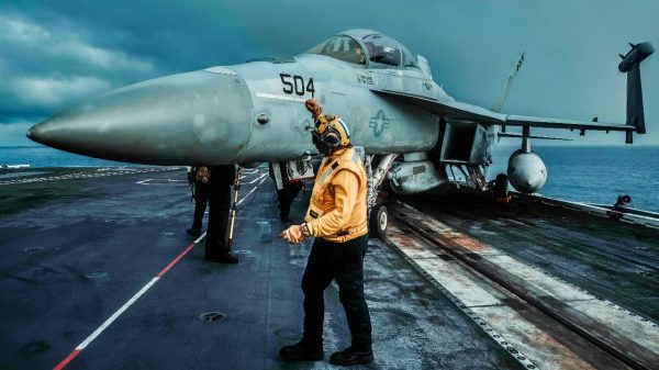 An E/A-18G Growler, attached to Electronic Attack Squadron (VAQ) 141, taxis on the flight deck of Nimitz-class aircraft carrier USS George Washington (CVN 73), while underway in the Indian Ocean, July 24, 2025. The USS George Washington Carrier Strike Group (GWA CSG) is conducting routine operations in the U.S. 7th Fleet area of operations. George Washington is the U.S. Navy’s premier forward-deployed aircraft carrier, a long-standing symbol of the United States’ commitment to maintaining a free and open Indo-Pacific region, while operating alongside allies and partners across the U.S. Navy’s largest numbered fleet. (U.S. Navy photo by Mass Communication Specialist Seaman Nicolas Quezada)