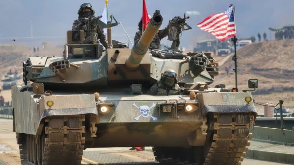 Republic of Korea army soldiers assigned to 5th Engineer Brigade, pull security on the K1 tank while it moves across M3 bridge vehicle as part of Freedom Shield 25/Combined Wet Gap Crossing training March 20, 2025 in South Korea. This training was intended to boost combat readiness between the U.S. and ROK Army. (U.S. Army photo by Pfc. Wilfred Salters)