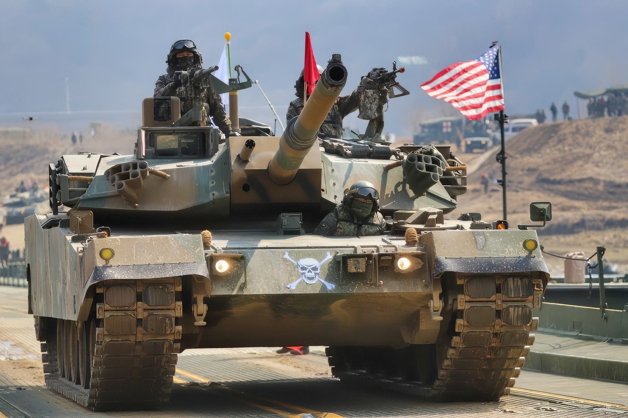 Republic of Korea army soldiers assigned to 5th Engineer Brigade, pull security on the K1 tank while it moves across M3 bridge vehicle as part of Freedom Shield 25/Combined Wet Gap Crossing training March 20, 2025 in South Korea. This training was intended to boost combat readiness between the U.S. and ROK Army. (U.S. Army photo by Pfc. Wilfred Salters)