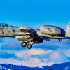 Idaho National Guard pilots land A-10 Thunderbolt IIs after a flight mission near Gowen Field on March 15, 2023 with the Boise foothills in the background. (U.S. National Guard photo by Master Sgt. Becky Vanshur)