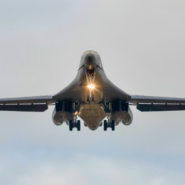 A U.S. Air Force B-1B Lancer assigned to the 345th Expeditionary Bomb Squadron, decends for landing at Ørland Air Base, Norway, during a Bomber Task Force Europe deployment, Aug. 9, 2025. The BTF mission highlights how we deliver effects rapidly across dynamic and contested environments through integrated training. (U.S. Air Force photo by Staff Sgt. Tambri Cason)