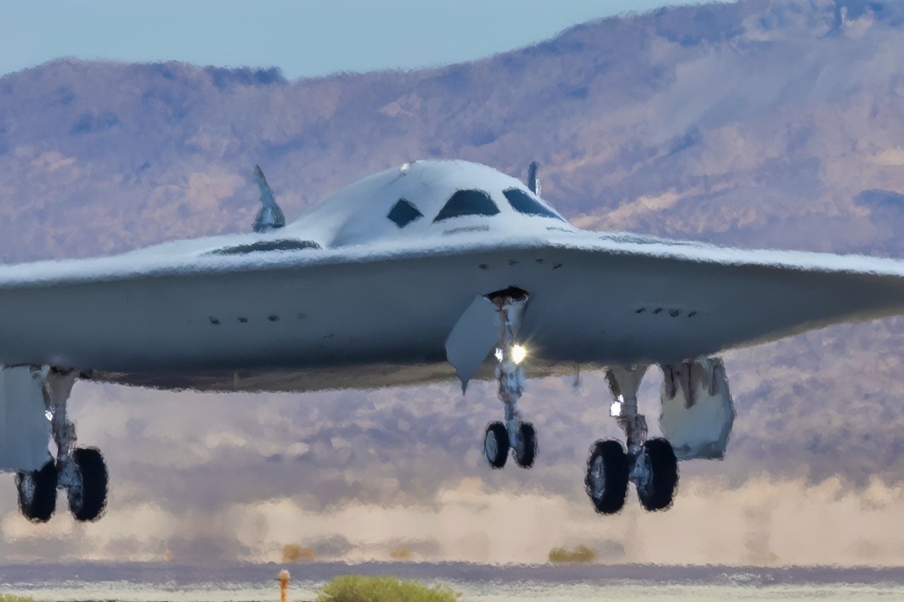 A B-21 Raider test aircraft lands at Edwards Air Force Base, Calif., during ongoing developmental flight testing, Sept. 11, 2025. The B-21 will be the backbone of the bomber fleet; it will incrementally replace the B-1 Lancer and B-2 Spirit bombers. (U.S Air Force photo by Todd Schannuth)
