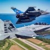 A joint test team including the Flight Test Division of the French Directorate General of Armaments (DGA/EV), the French Naval Aeronautics Experimentation Center (CEPA/10S), and the U.S. Navy’s Air Test and Evaluation Squadron (VX) 23 are leading flight tests that will enable the French fighter jet Dassault Rafale to aerial refuel with naval aviation’s F/A-18 Hornet and Super Hornet and EA-18G Growler. The tanker qualification partnership paves the way for an extended reach and enhanced interoperability for allied airpower. (U.S. Navy photo by Erik Hildebrandt) Erik_Hildebrandt