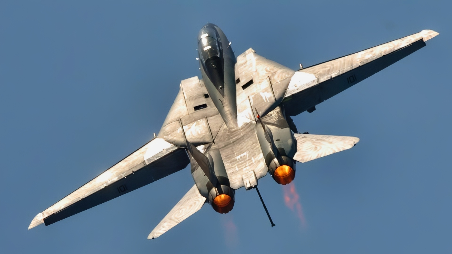 (June 19, 2006) – An F-14D Tomcat from Fighter Squadron Three One (VF-31), the “Tomcatters,” performs a fly by past the Nimitz-class aircraft carrier USS Dwight D. Eisenhower (CVN 69). For the past 30 years, the F-14 Tomcat has assured U.S. air superiority, playing a key role in ensuring victory and preserving peace around the world. The F-14 Tomcat will be removed from service and officially stricken from the inventory in September of 2006. U.S. Navy photo by Photographer’s Mate 2nd Class Miguel A. Contreras PH2 CONTRERAS MIGUEL