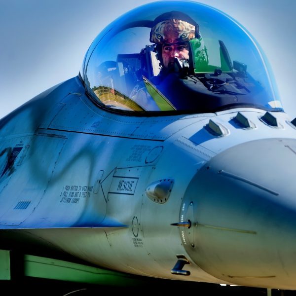 A Polish F-16 pilot awaits instructions from his crew chief after completion of a Baltic Air Policing sortie at Šiauliai Air Base, Lithuania, Aug. 30, 2017. The Polish air force recently relinquished control of the NATO Baltic Air Policing mission to the U.S. Air Force for the forty-fifth rotation of allied protection of the sovereign skies of the Baltic region since Baltic Air Policing operations began in 2004. (U.S. Air Force photo/ Tech. Sgt. Matthew Plew)