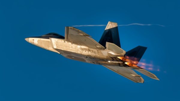 A U.S. Air Force F-22 Raptor assigned to Joint Base Langley-Eustis, Virginia, takes off during Checkered Flag 23-1 at Tyndall Air Force Base, Florida, Nov. 4, 2022. Checkered Flag is a large-force aerial exercise which fosters readiness and interoperability through the incorporation of 4th and 5th-generation aircraft during air-to-air combat training. The 23-1 iteration of the exercise was held Oct. 31 - Nov. 10, 2022. (U.S. Air Force photo by Tech. Sgt. Betty R. Chevalier)