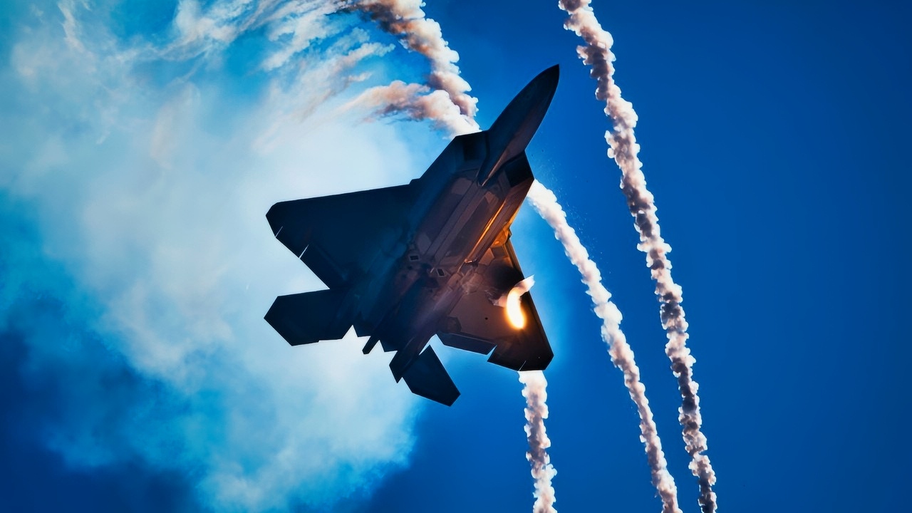 A U.S. Air Force F-22 Raptor, flown by Capt. Samuel “Razz” Larson, F-22 Raptor Demonstration Team pilot, deploys flares over the Gulf of Mexico during the 2024 Gulf Coast Salute Air Show at Panama City Beach, Florida, May 4. The F-22’s unique combination of stealth, speed, agility and situational awareness, combined with lethal long-range air-to-air and air-to-ground weaponry, makes it one of the most advanced fighters in the world. (U.S. Air Force photo by Staff Sgt. Stefan Alvarez)