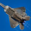 A U.S. Air Force F-22 Raptor assigned to Joint Base Langley-Eustis, Virginia, takes off during Checkered Flag 23-1 at Tyndall Air Force Base, Florida, Nov. 4, 2022. Checkered Flag is a large-force aerial exercise which fosters readiness and interoperability through the incorporation of 4th and 5th-generation aircraft during air-to-air combat training. The 23-1 iteration of the exercise was held Oct. 31 - Nov. 10, 2022. (U.S. Air Force photo by Tech. Sgt. Betty R. Chevalier)