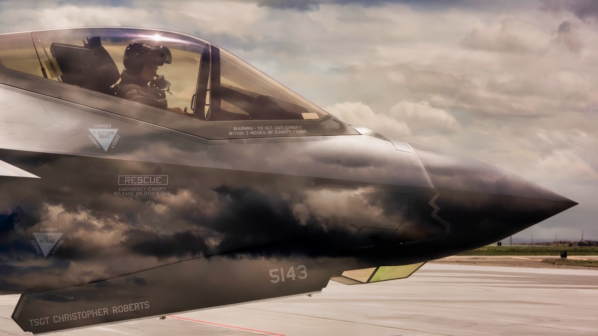 An F-35 Lightning II pilot from Hill Air Force Base, Utah, waits to taxi onto the runway June 20, 2019, at Mountain Home Air Force Base, Idaho. This double exposure photo was achieved in camera by combining two perspectives, a photo of the F-35 and photo of the sky, to create a singular image. (U.S. Air Force photo illustration by Airman 1st Class Andrew Kobialka)