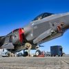 U.S. Air Force Airmen load a munition onto an F-35 Lightning II in preparation to conduct a scenario during Checkered Flag 24-1 at Tyndall Air Force Base, Florida, Nov. 1, 2023. Checkered Flag is a large-force aerial exercise held at Tyndall Air Force Base which fosters readiness and interoperability through the incorporation of 4th and 5th-generation aircraft during air-to-air combat training. (U.S. Air Force photo by Staff Sgt. Jake Carter)