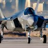 A Royal Australian Air Force F-35 Lightning II taxis out for a morning mission at Nellis Air Force Base, Nevada, Jan. 31, 2024. Approximately 150 Royal Australian aviators participated in Bamboo Eagle 24-1 with Royal Air Force and U.S. Air Force assets. These exercises build partnerships and is an opportunity to enhance the readiness and training necessary to respond as a joint force to any potential crisis or challenge across the globe. (U.S. Air Force photo by William R. Lewis)