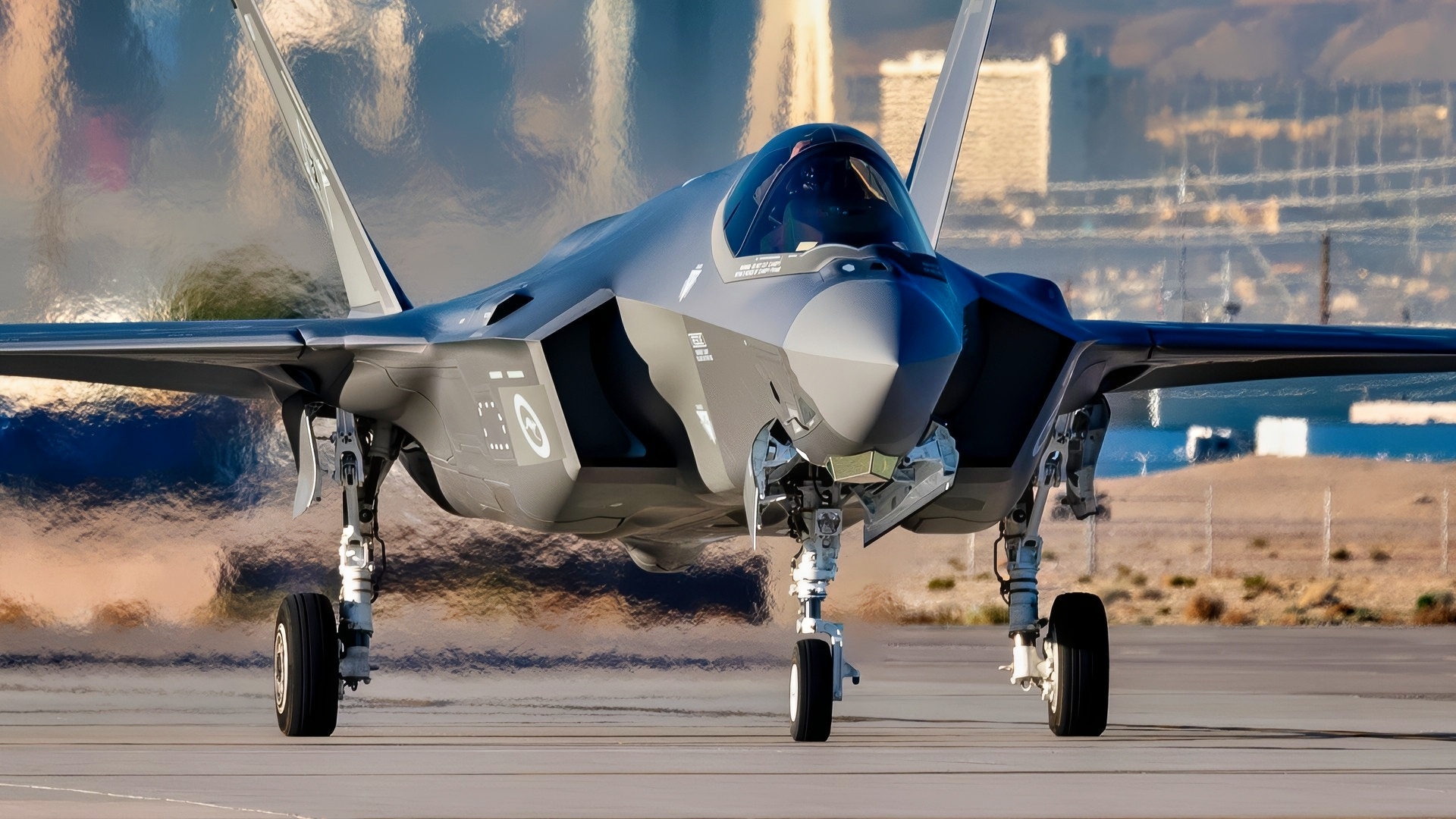 A Royal Australian Air Force F-35 Lightning II taxis out for a morning mission at Nellis Air Force Base, Nevada, Jan. 31, 2024. Approximately 150 Royal Australian aviators participated in Bamboo Eagle 24-1 with Royal Air Force and U.S. Air Force assets. These exercises build partnerships and is an opportunity to enhance the readiness and training necessary to respond as a joint force to any potential crisis or challenge across the globe. (U.S. Air Force photo by William R. Lewis)