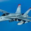 A U.S. Marine Corps F/A-18 Hornet pulls away from a U.S. Air Force KC-135 Stratotanker from Kadena Air Base after refueling over the Pacific Jan. 3, 2024. Conducting joint operations enhances the lethality and readiness of U.S. forces and its ability to project superior airpower to the Indo-Pacific region. (U.S. Air Force photo by Senior Airman Cedriue Oldaker)