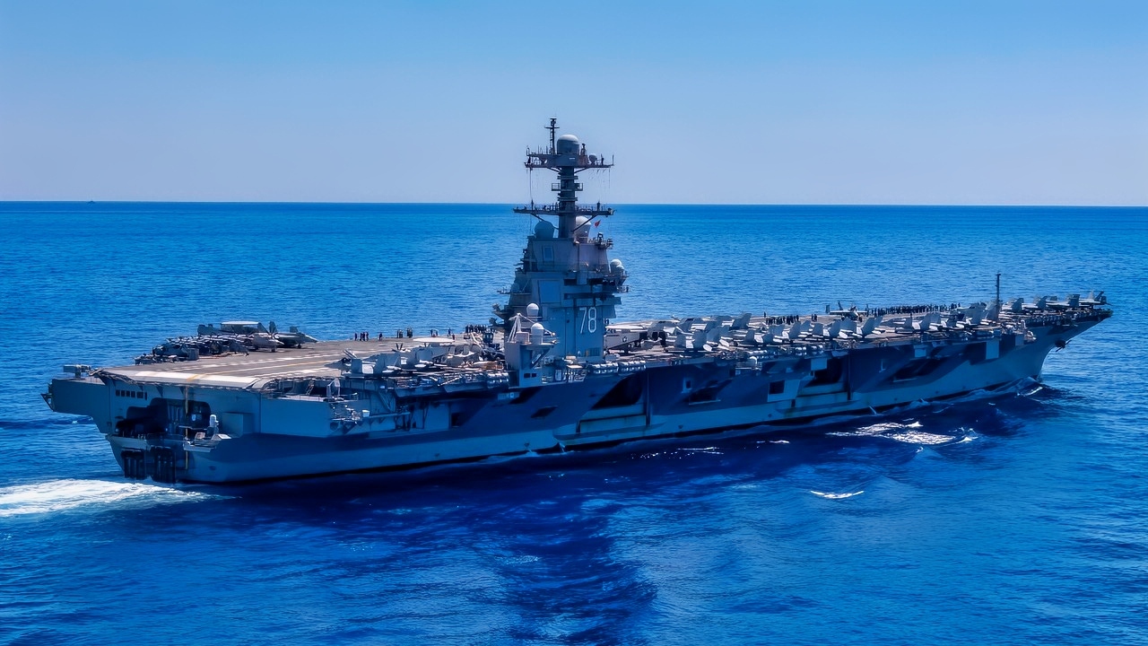 The world's largest aircraft carrier, USS Gerald R. Ford (CVN 78) transits the Mediterranean Sea, August 1, 2025. Gerald R. Ford, a first-in-class nuclear aircraft carrier and deployed flagship of Carrier Strike Group Twelve, is on a scheduled deployment in the U.S. 6th Fleet area of operations to support the warfighting effectiveness, lethality, and readiness of U.S. Naval Forces Europe-Africa, and defend U.S., Allied, and partner interests in the region. (U.S. Navy photo by Mass Communication Specialist Seaman Brianna Barnett)