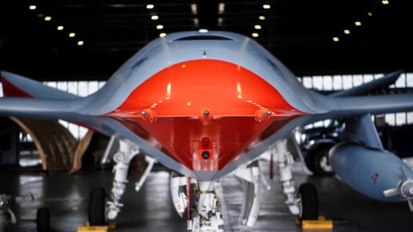 A MQ-25 Stingray sits parked in Hangar 1 on Scott Air Force Base, Illinois, May 12, 2023. The MQ-25 Stingray will be the world’s first operational, carrier-based unmanned aircraft and provide aerial refueling and intelligence, surveillance and reconnaissance (ISR) capabilities that enhance capability and versatility for the Carrier Air Wing (CVW) and Carrier Strike Group (CSG). (U.S. Air Force photo by Staff Sgt. Solomon Cook)