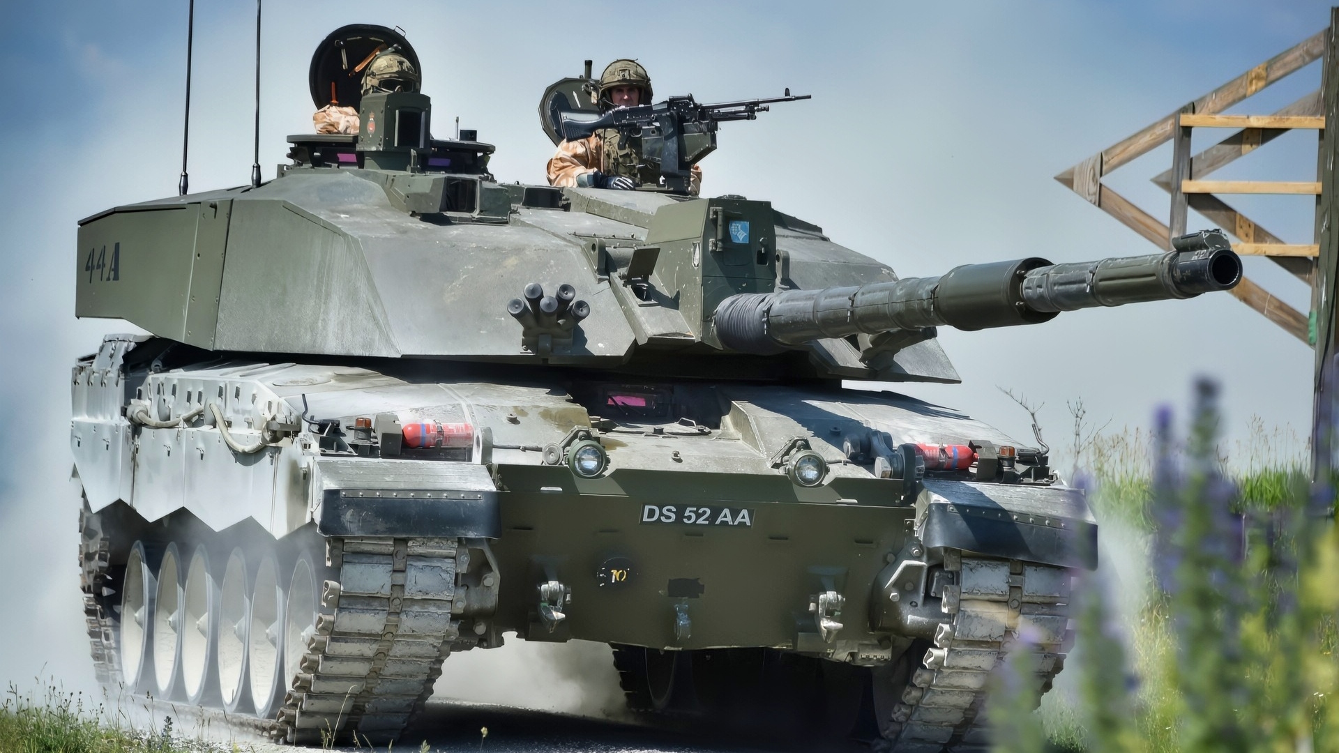 British soldiers with the Queen’s Royal Hussars move a Challenger II main battle tank down range during the Strong Europe Tank Challenge at the 7th Army Training Command’s Grafenwoehr Training Area, June 4, 2018. The U.S. Army Europe and the German Army co-host the third Strong Europe Tank Challenge, which is an annual training event designed to give participating nations a dynamic, productive and fun environment in which to foster military partnerships, form Soldier-level relationships, and share tactics, techniques and procedures. (U.S. Army photo by Gertrud Zach)
