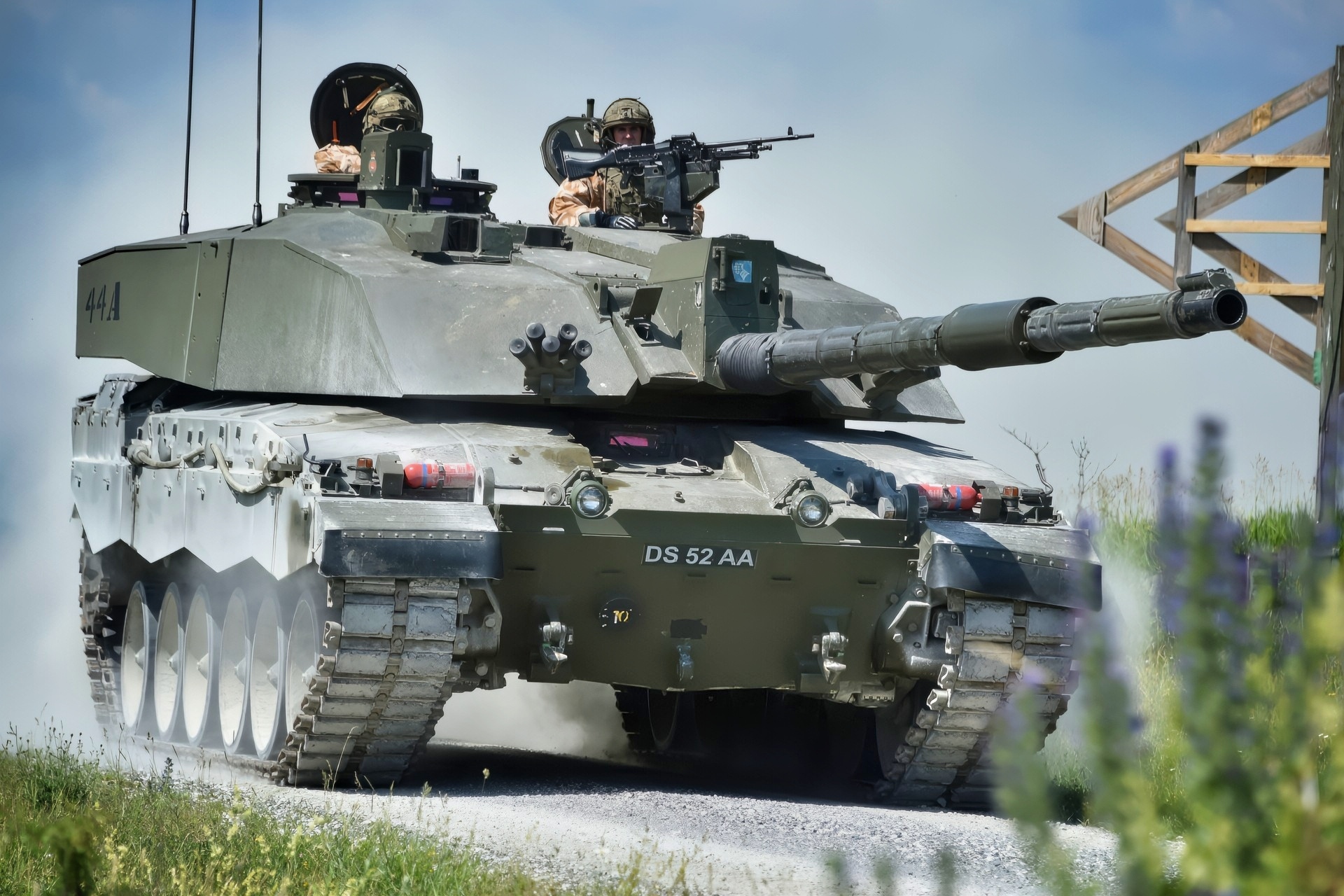 British soldiers with the Queen’s Royal Hussars move a Challenger II main battle tank down range during the Strong Europe Tank Challenge at the 7th Army Training Command’s Grafenwoehr Training Area, June 4, 2018. The U.S. Army Europe and the German Army co-host the third Strong Europe Tank Challenge, which is an annual training event designed to give participating nations a dynamic, productive and fun environment in which to foster military partnerships, form Soldier-level relationships, and share tactics, techniques and procedures. (U.S. Army photo by Gertrud Zach)