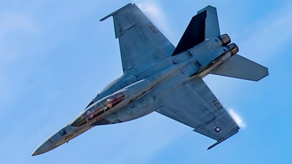 An F/A-18 Super Hornet from Naval Air Station Oceana, Virginia, performs an aerial demonstration over Rickenbacker International Airport, Ohio, June 16, 2024, as part of the Columbus Air Show. This year’s event featured more than 20 military and civilian planes, including a KC-135 Stratotanker from the 121st Air Refueling Wing, which served as the base of operations for military aircraft participating in the show. (U.S. Air National Guard photo by Senior Airman Ivy Thomas)
