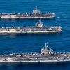 The U.S. Navy aircraft carriers USS Nimitz (CVN-68), USS Theodore Roosevelt (CVN-71) and USS Ronald Reagan (CVN-76) underway in the Western Pacific on 12 November 2017. The strike groups were underway and conducting operations in international waters as part of a three-carrier strike force exercise. This was the first time since August 2007 that three U.S. Navy carriers operated together. In 2007, USS Kitty Hawk (CV-63), USS Nimitz (CVN-68) and USS John C. Stennis (CVN-74) participated in exercise "Valiant Shield".