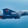 A 96th Test Wing F-15E Strike Eagle flies during a test mission May 22, 2025 over Eglin Air Force Base, Florida. The 96 TW and the 53rd Wing teamed up to test AGR-20F Advanced Precision Kill Weapon System II laser-guided rockets on the F-15E in May in an effort to get the capability to the warfighter as quickly as possible. (U.S. Air Force photo by Staff Sgt. Thomas Barley)