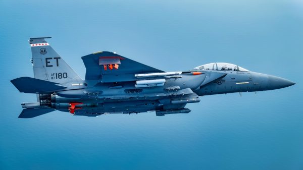 A 96th Test Wing F-15E Strike Eagle flies during a test mission May 22, 2025 over Eglin Air Force Base, Florida. The 96 TW and the 53rd Wing teamed up to test AGR-20F Advanced Precision Kill Weapon System II laser-guided rockets on the F-15E in May in an effort to get the capability to the warfighter as quickly as possible. (U.S. Air Force photo by Staff Sgt. Thomas Barley)