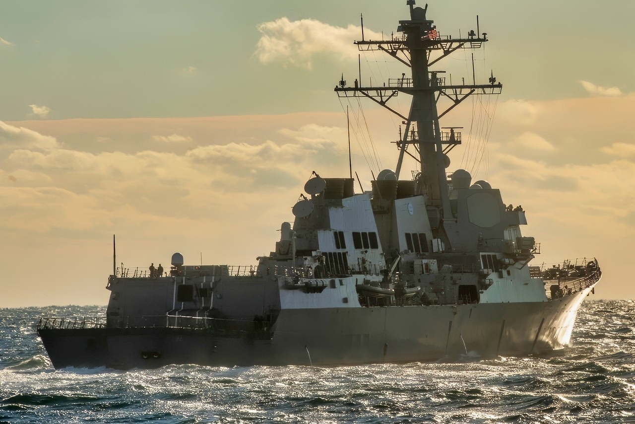 The Arleigh Burke-class guided-missile destroyer USS Lassen (DDG 82) moves into position for an underway exercise with the British Royal Navy aircraft carrier HMS Queen Elizabeth (R08) and Pre-Commissioning Unit (PCU) Michael Monsoor (DDG 1001). The future USS Michael Monsoor is the second ship in the Zumwalt-class of guided-missile destroyers. (Photo by Mass Communication Specialist 1st Class John Philip Wagner, Jr./Released)