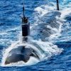 Virginia-class attack submarine USS North Carolina (SSN 777) sails in formation, off the coast of Hawaii during Exercise Rim of the Pacific (RIMPAC) 2024, July 22. Twenty-nine nations, 40 surface ships, three submarines, 14 national land forces, more than 150 aircraft and 25,000 personnel are participating in RIMPAC in and around the Hawaiian Islands, June 27 to Aug. 1. The world's largest international maritime exercise, RIMPAC provides a unique training opportunity while fostering and sustaining cooperative relationships among participants critical to ensuring the safety of sea lanes and security on the world's oceans. RIMPAC 2024 is the 29th exercise in the series that began in 1971. (U.S. Navy photo by Mass Communication Specialist 1st Class John Bellino)