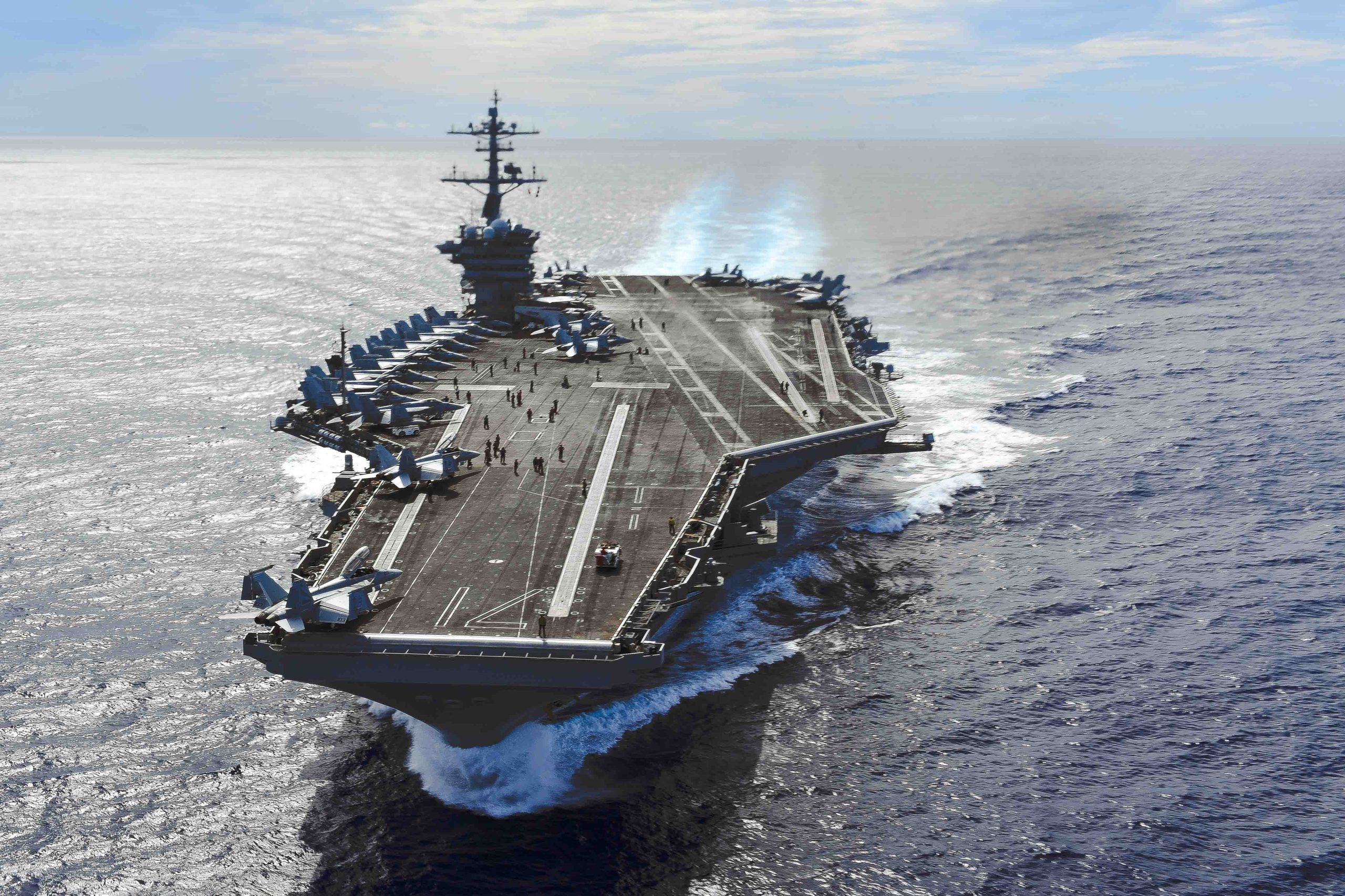 PHILIPPINE SEA (Sept. 24, 2024) The Nimitz-class aircraft carrier USS Theodore Roosevelt (CVN 71) transits the Philippine Sea, Sept. 24, 2024. Theodore Roosevelt, flagship of Carrier Strike Group 9, is underway conducting routine operations in the U.S. 7th Fleet area of operations. U.S. 7th Fleet is the U.S. Navy’s largest forward-deployed numbered fleet, and routinely interacts and operates with allies and partners in preserving a free and open Indo-Pacific region. (U.S. Navy photo by Mass Communication Specialist 3rd Class Adina Phebus)