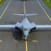 A U.S. Air Force Airman, assigned to the 345th Expeditionary Bomb Squadron, stands a B-1B Lancer during a Bomber Task Force Europe mission at Ørland Air Base, Norway, Aug. 21, 2025. BTF missions expose and familiarize aircrew with air bases and operations in different geographic combatant command areas of operations to enable strategic access and integration with coalition forces to deter global conflict. (U.S. Air Force photo by Staff Sgt. Tambri Cason)