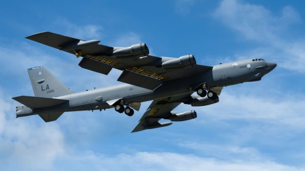 B-52 Bomber Flying High in Sky