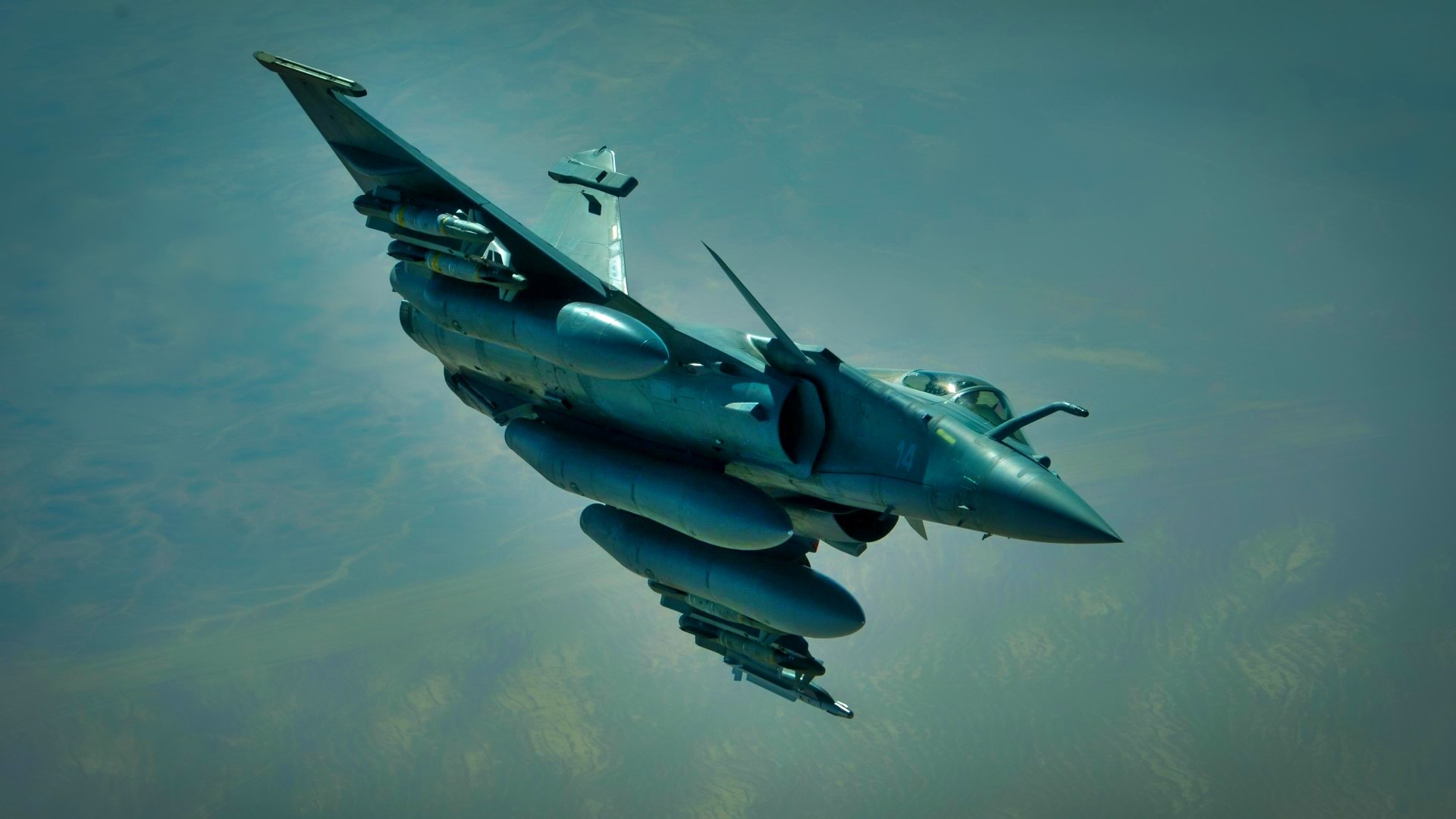 A French Naval Rafale departs after receiving fuel from a 908th Expeditionary Air Refueling Squadron KC-10 Extender during a flight in support of Operation Inherent Resolve June 2, 2017. Rafale is a French twin-engine, canard delta wing, multirole fighter aircraft with a wide range of weapons. The Rafale is intended to perform air supremacy, interdiction, aerial reconnaissance, ground support, in-depth strike and anti-ship strike missions. (U.S. Air Force photo by Staff Sgt. Michael Battles)