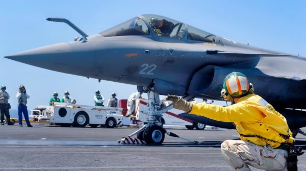 (July 20, 2008) Lt. Cmdr. Christopher Biggs shoots a French F-2 Rafale off the aircraft carrier USS Theodore Roosevelt (CVN 71) during combined French and American carrier qualifications. This event marks the first integrated U.S. and French carrier qualifications aboard a U.S. aircraft carrier. U.S. Navy photo by Mass Communication Specialist 3rd Class Jonathan Snyder (Released)